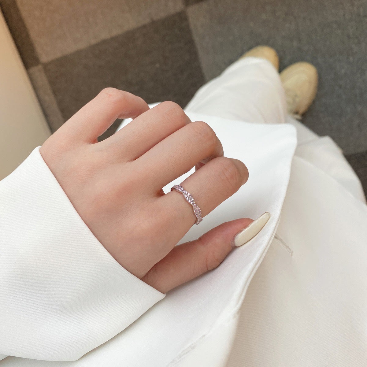 Fedina intrecciata con zirconi rosa