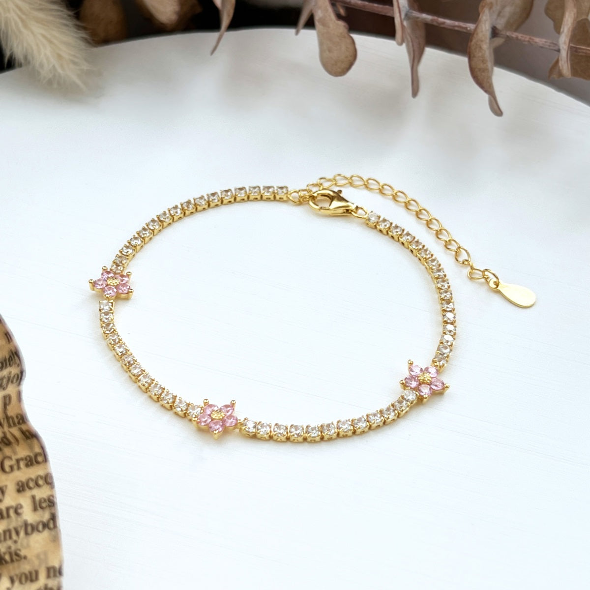 Bracciale fiori di pesco con zirconi