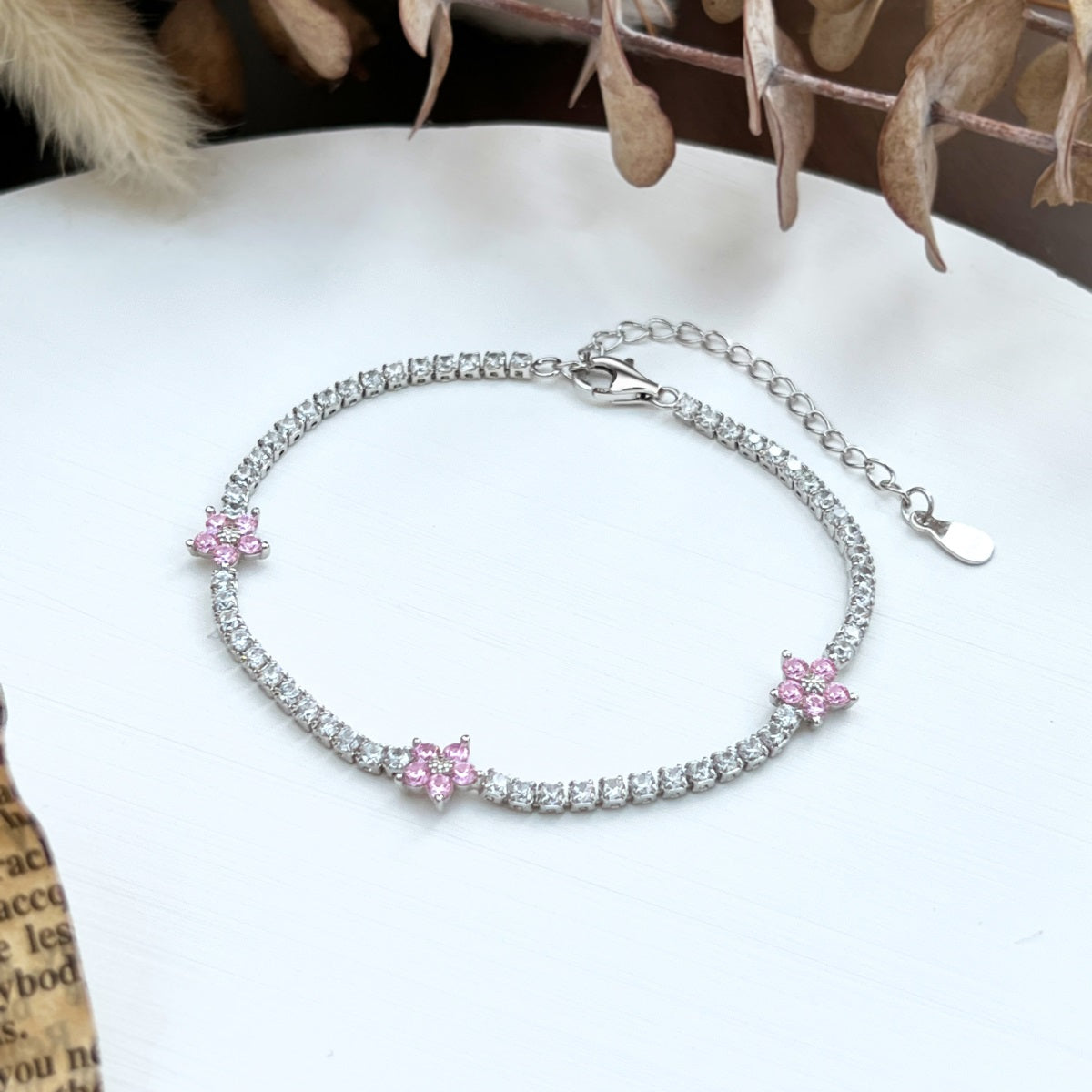 Bracciale fiori di pesco con zirconi