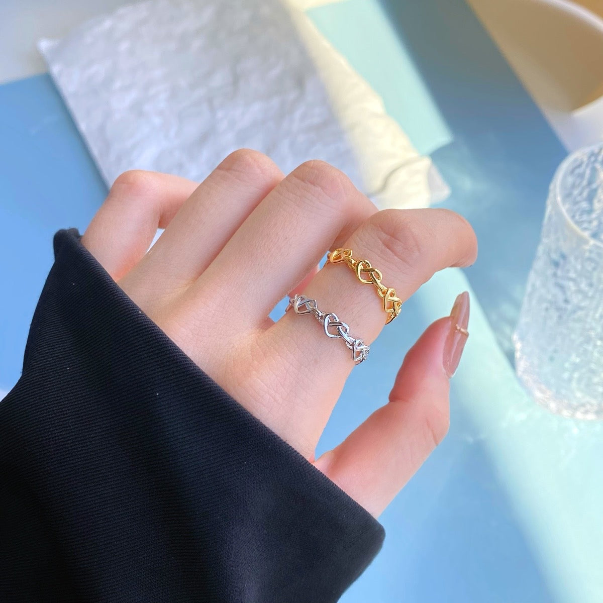 Anello cuori interecciati