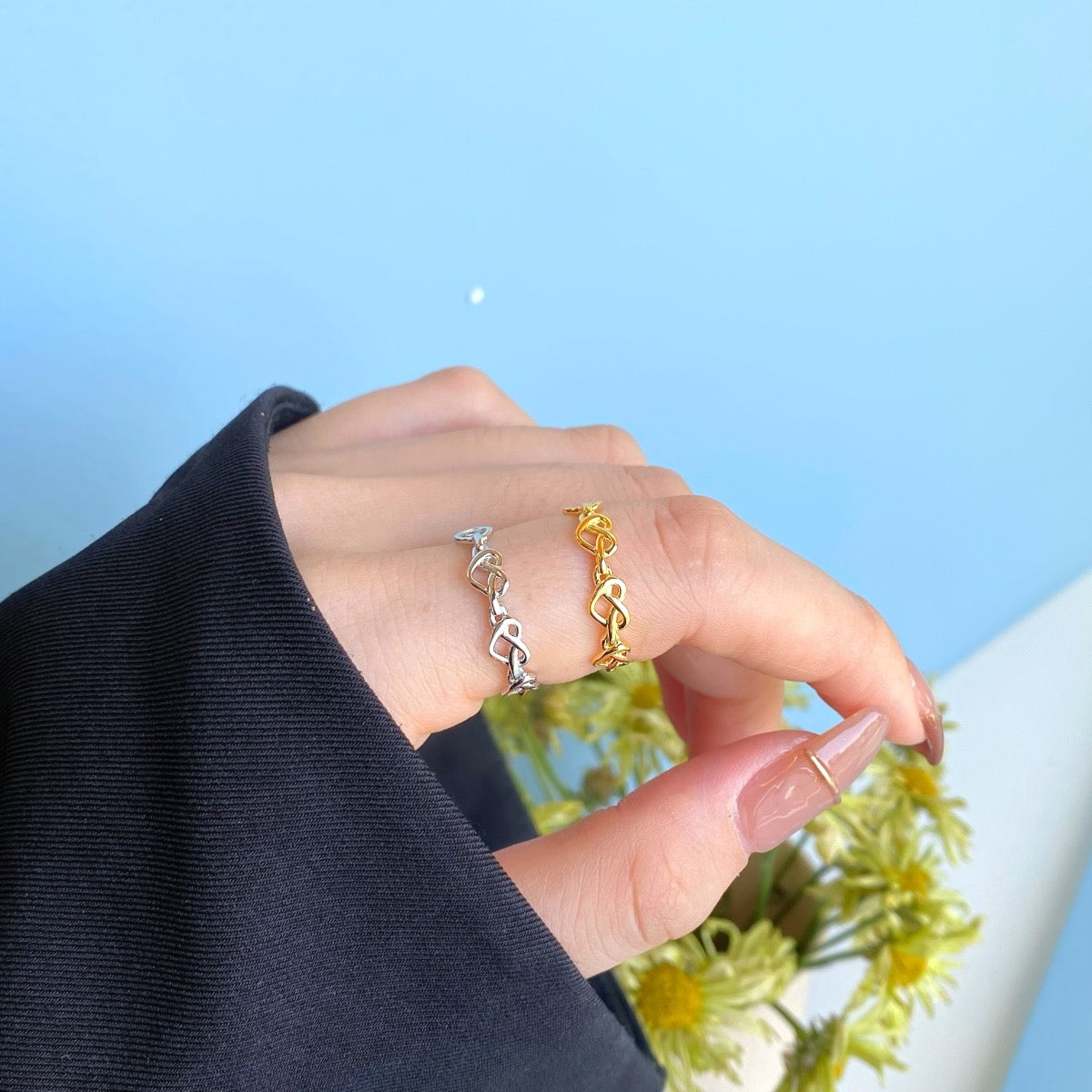 Anello cuori interecciati